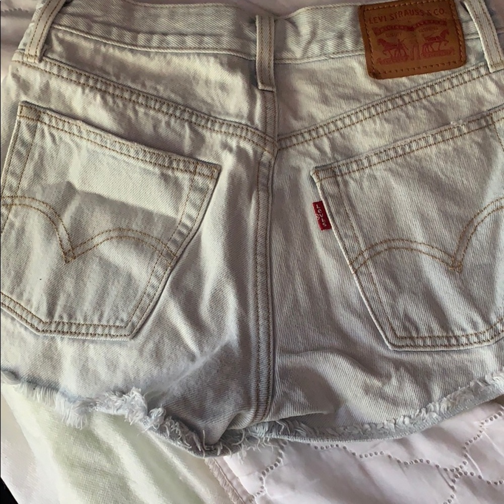 Red tag Levi shorts: light wash, size 25.